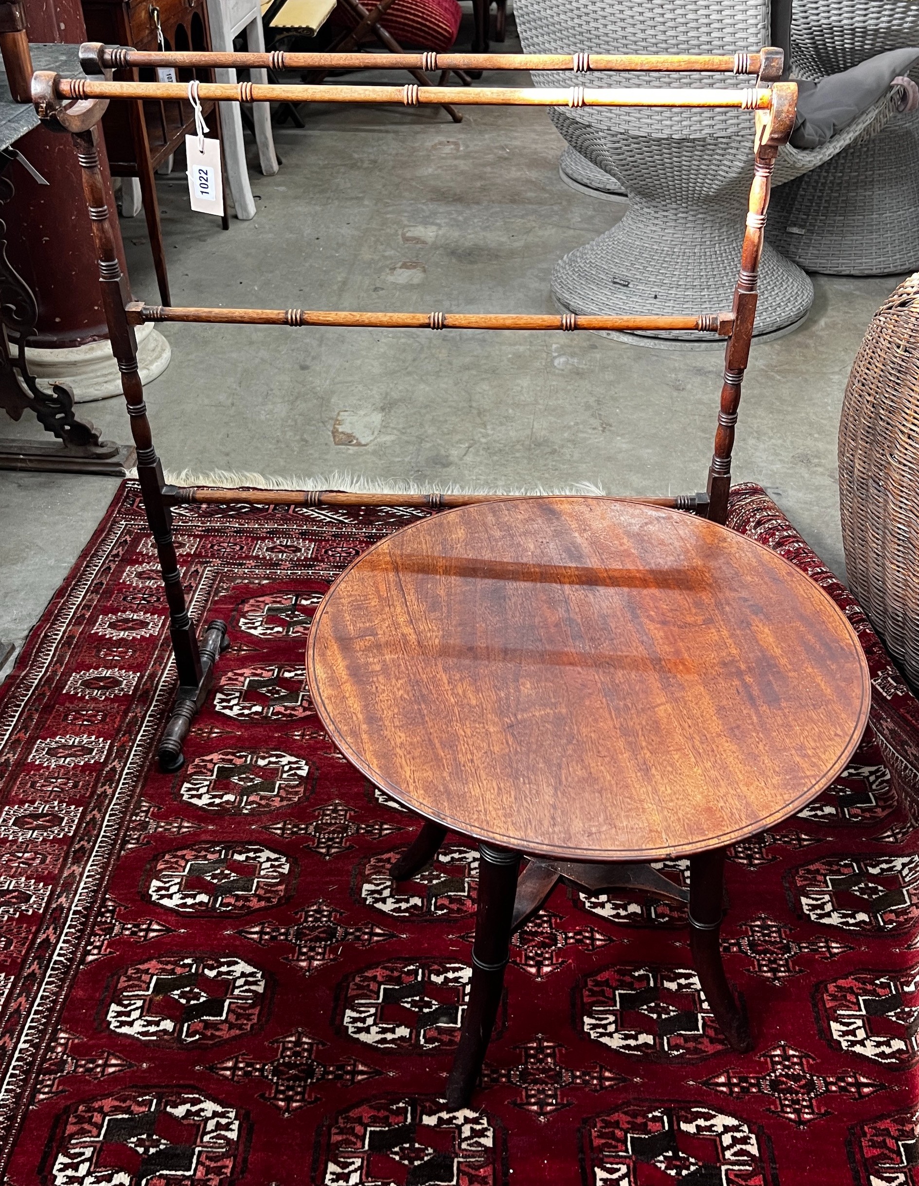 A Victorian mahogany towel rail, height 82cm and a Victorian and later circular occasional table